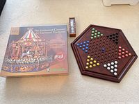 Puzzle box, Chinese Checkers board, storage box laid out