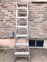 Front view of aluminum A-frame ladder extended