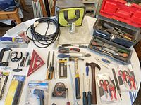 Overview of all hand tools, bag, toolbox and cord