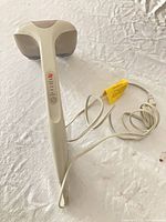 Full view of HoMedics handheld massager with cord