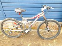 Side profile of Krank 26" full-suspension mountain bike