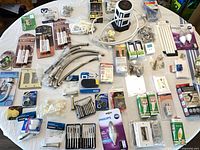 Overall view of entire mixed lot spread on table