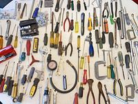 Tabletop view of entire assortment of hand tools