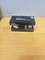 Front view of boxed 2-piece mug set