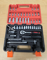 Closed case opened showing full 53-piece set