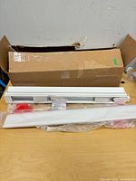 Blind, hardware in packaging, and box