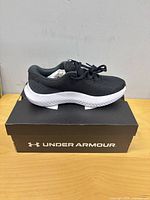 Left side view of right shoe on box