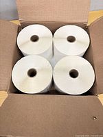 Top view of four label rolls inside box