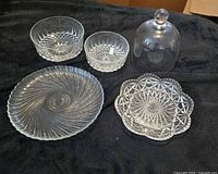 Group shot of all five pressed glass items