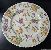 Front of plate showing floral transfer pattern and rim detail