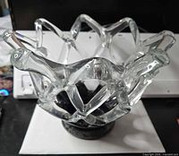 overall view of clear lattice glass bowl on black pedestal