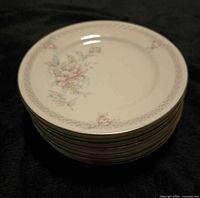 Stack of floral Noritake Easthampton bread & butter plates