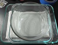 Rectangular dish with square and round pieces nested inside