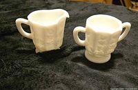 Creamer and sugar bowl front view
