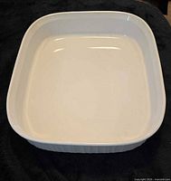 Top view of white rounded-square baking dish interior