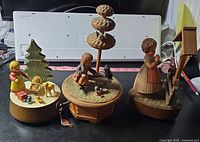 All three wooden music boxes grouped