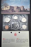 Complete set in Mint folder with COA visible