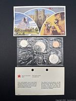 Outer envelope, COA card, sealed pliofilm strip with six coins