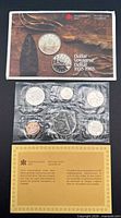 Full set: outer envelope, certificate, sealed coin strip