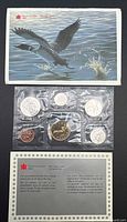 outer envelope with loon artwork, sealed coin set, COA card