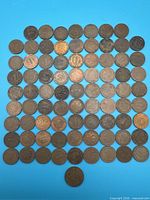 All 80 Pfennig coins arranged in square on blue background