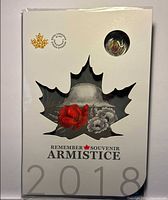Front of sealed Armistice coin set sleeve