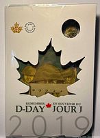 Front of sealed 2019 Remember D-Day coin set folder with maple-leaf window and Royal Canadian Mint logo