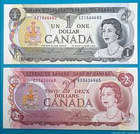 Obverse of both banknotes side by side, serial numbers visible
