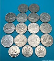 All 17 coins laid out obverse side for full lot overview