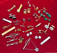 Overview of entire lot laid out on red fabric