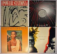 Group photo of all four vinyl records showing front jackets/sleeves
