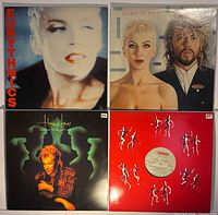 Four album covers arranged in grid showing all records