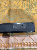 Label side of Canon Power Winder A showing on-off switch and compatibility text