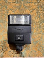Front view of Canon Speedlite 155A flash