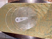 Top view of clear acrylic stand showing bubble column and circular tiers