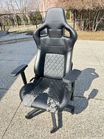 Front view of chair showing design and peeling seat cover