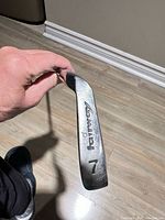 Sole of 7 iron showing Fairway branding and club number