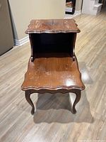 Front angled view showing full two-tier table with cabriole legs