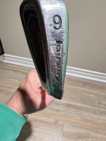 Heel view showing number 9 and brand mark