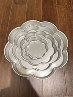 Nested view of all four flower pans