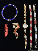 Front view of all seven jewelry items