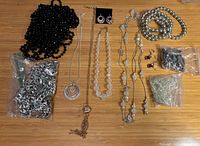 all jewelry pieces laid out on surface
