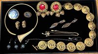 Front view of entire jewellery lot displayed in tray
