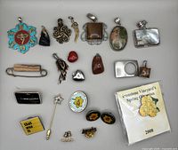 Front view of all pendants and pins laid out