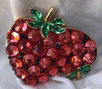 front view showing rhinestones and leaves