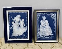 Both framed plaques front view