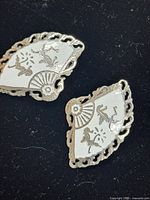 Pair of fan-shaped sterling enamel earrings front view