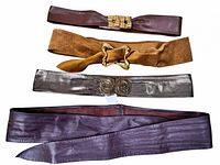 All four belts laid out showing colors and clasps