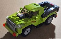 Left-front view of assembled green LEGO pickup truck