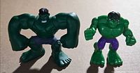 Front view of both Hulk figures standing